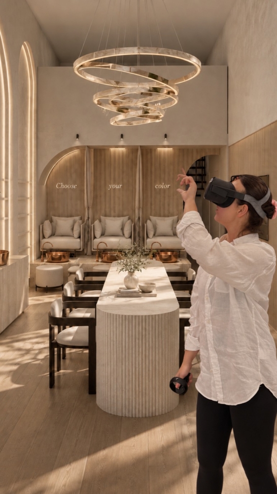 Our client experiencing her new nails bar, through virtual reality.